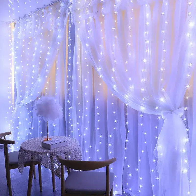 White sheer curtain decorated with warm glowing decorbites™ festive usb fairy lights 6x3m creating soft ambiance