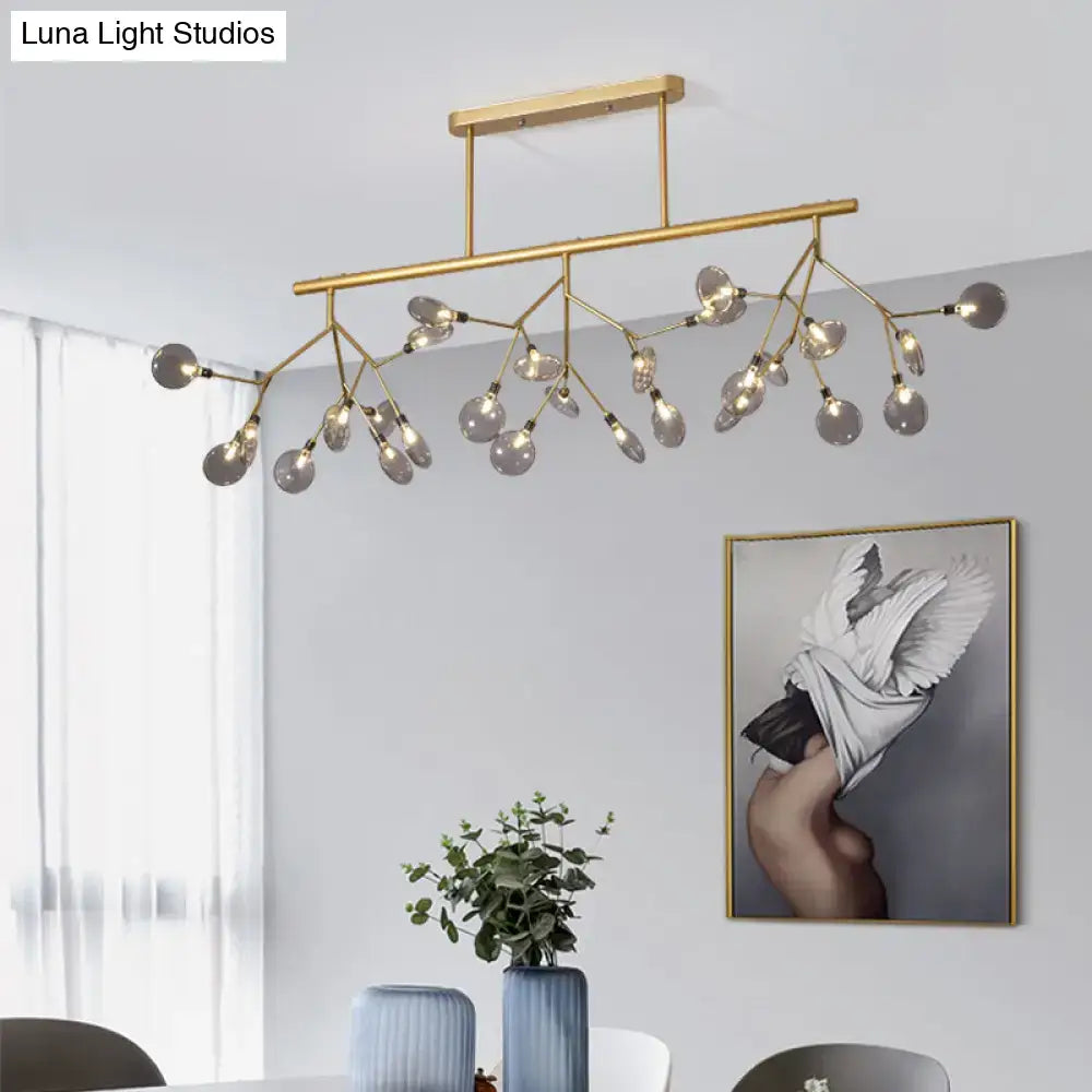 Gold-toned decorbites firefly island pendant light with branching arms and clear glass globes for 110v-120v and 220v-240v use