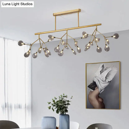 Gold-toned decorbites firefly island pendant light with branching arms and clear glass globes for 110v-120v and 220v-240v use
