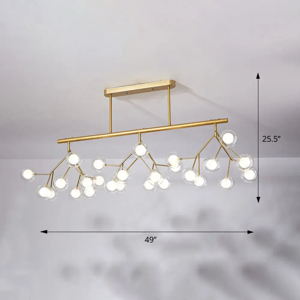 Gold-toned DecorBites™ Firefly Island pendant light with 27 clear glass globes black gold acrylic 110v-120v 220v-240v