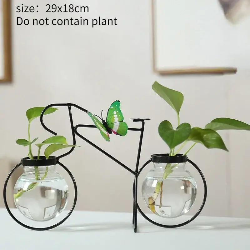 Decorbites™ flamingo metal vase in black shaped like a bicycle with glass spheres and butterfly for home decor