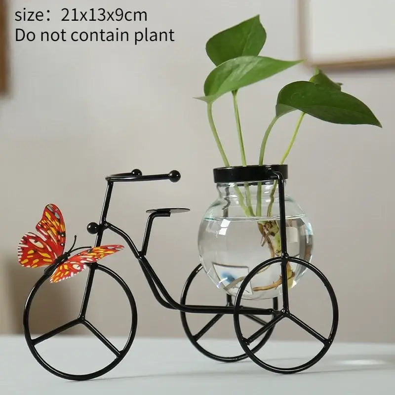 Black metal bicycle-shaped metal vase with clear glass sphere and orange red butterfly for home decor flamingo metal vase