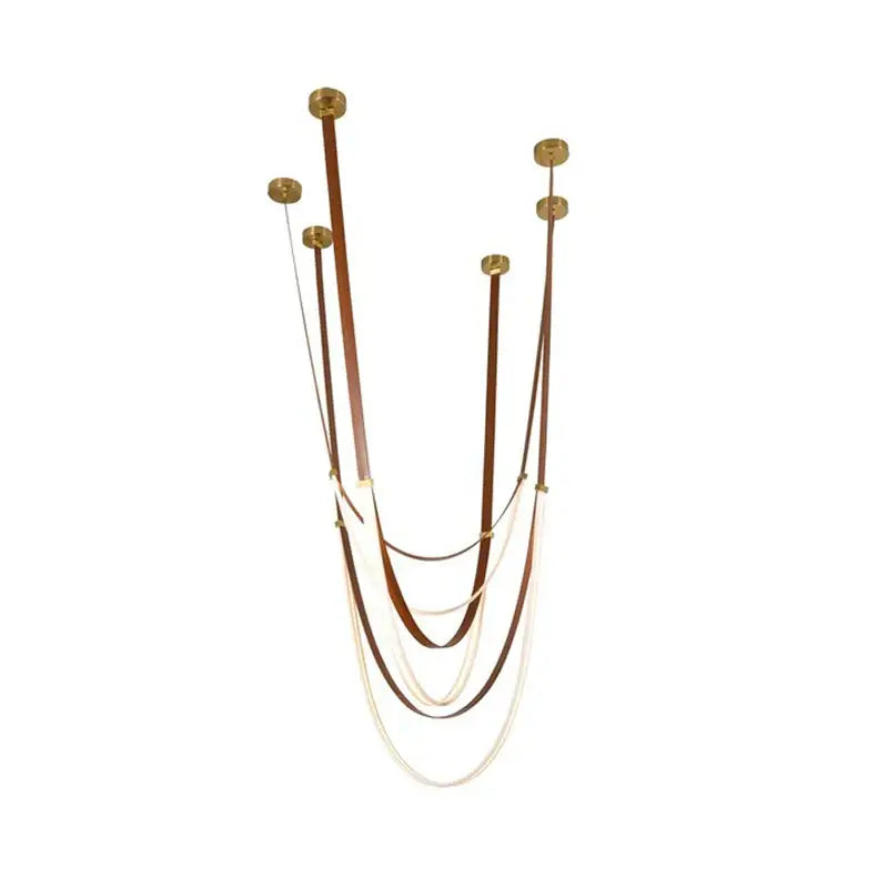 Modern chandelier with multiple tiers of brown and cream flexible leather belt straps suspended from brass mounts for living room