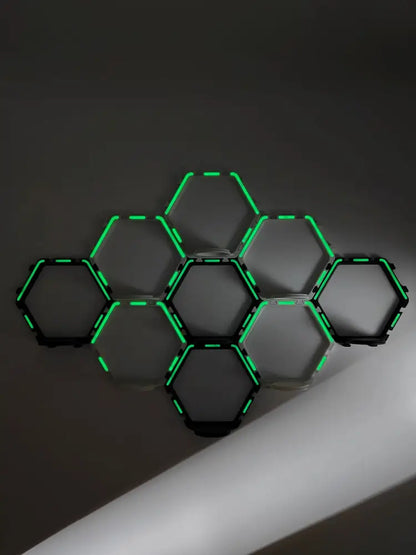 DecorBites™ floating display shelf featuring a modern hexagonal light fixture with glowing green led edges and black frames