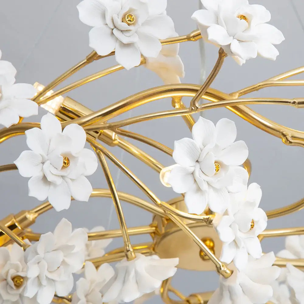 Decorbites™ floral french white ceramic chandelier with delicate white flower design and golden metallic branches centers