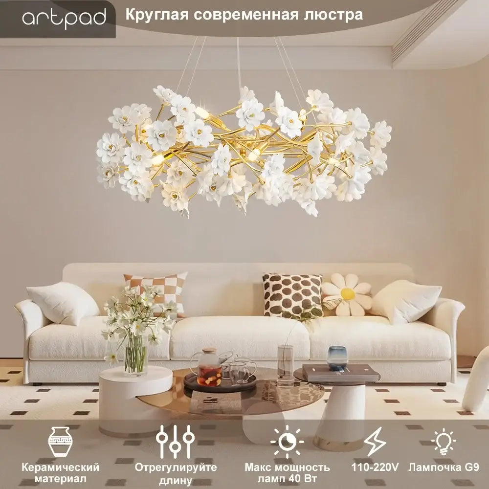 A modern decorbites™ floral french white ceramic chandelier with white flower design and gold-toned branches by artpad