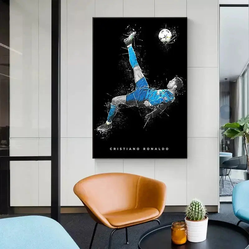 Black-framed canvas print of football star posters featuring cristiano ronaldo in blue and white gear mid-air kicking ball