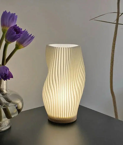 A french cream style desk lamp with a ribbed cream shade and wooden base ideal for bedside or study use
