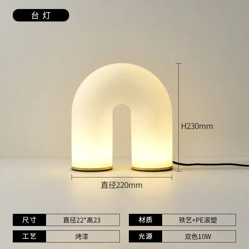 A modern decorbites french cream u-shaped floor lamp with warm LED light and matte iron and PE plastic finish
