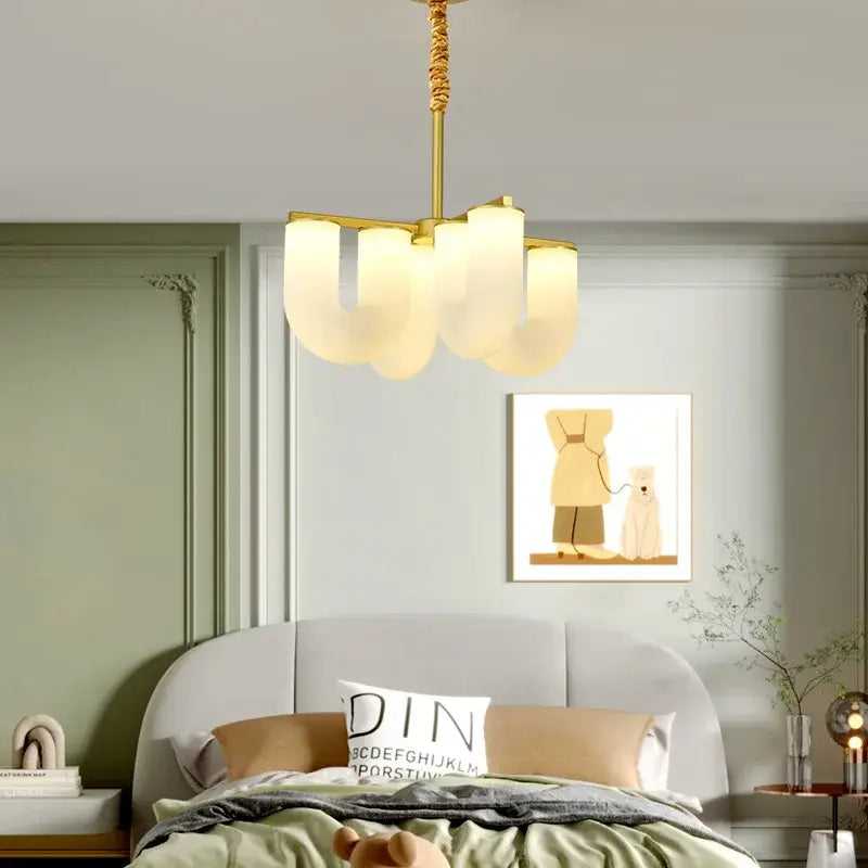 Gold-toned floor lamp with frosted glass shades shaped like overlapping petals from decorbites french cream collection