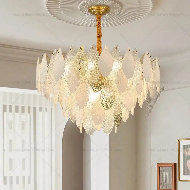 Elegant gold-toned decorbites french crystal chandelier with cascading translucent leaf-shaped glass panels for living room lighting