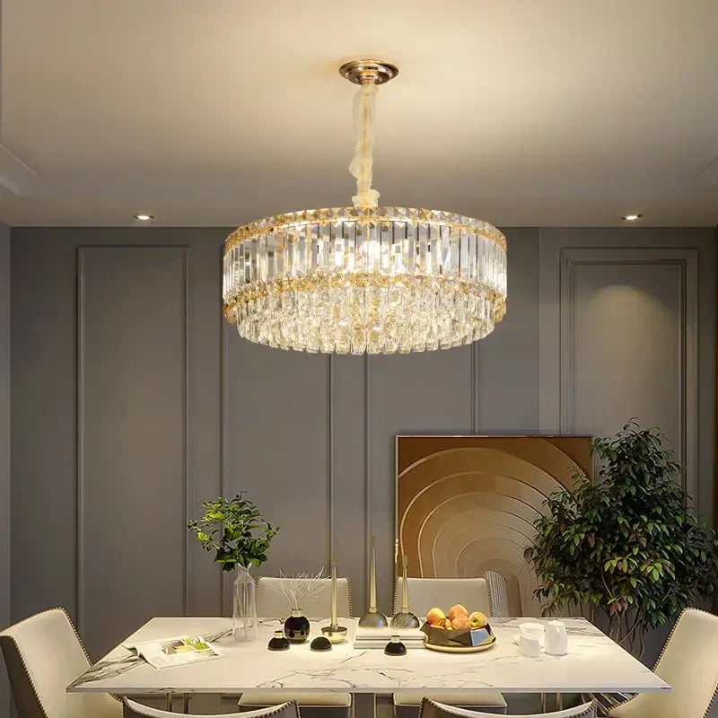 A decorbites french crystal chandelier with two tiers of clear faceted crystals and polished gold brass fixture for living room