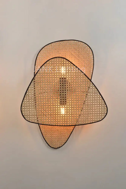 A modern wall-mounted rattan chandelier in warm beige tones with geometric french design for home lighting decor