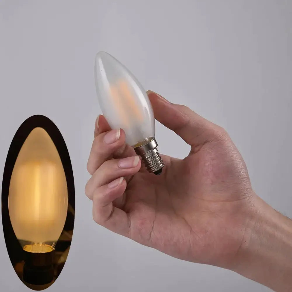 Decorbites frosted led candle light bulb with warm white frosted glass and metallic screw base for dining room use