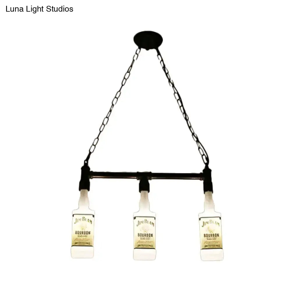 Black chain-and-bar pendant light with three illuminated jim beam bourbon bottles as lampshades in loft style