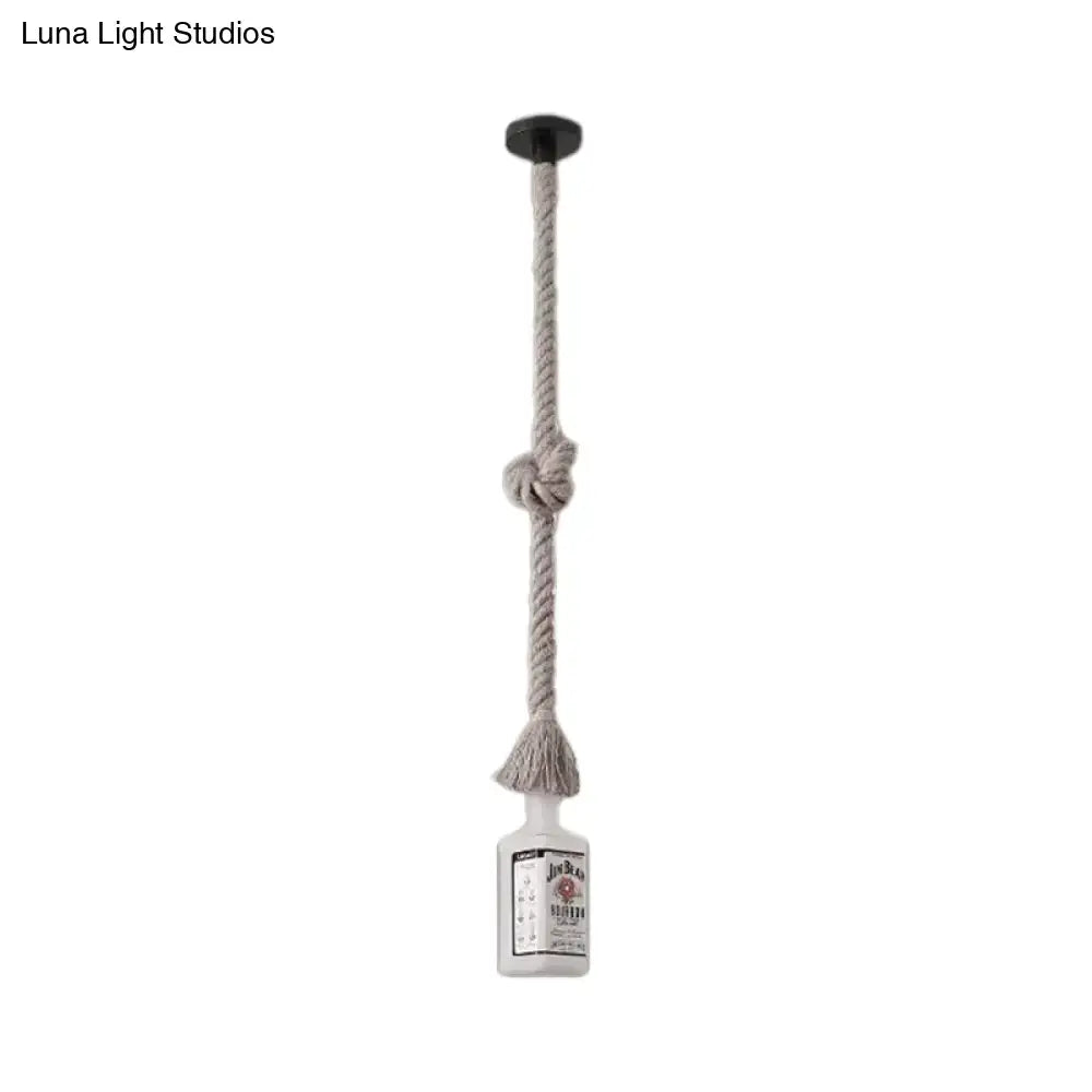Frosted white glass jack daniel’s bottle pendant lamp with beige rope and black ceiling mount for loft style decor
