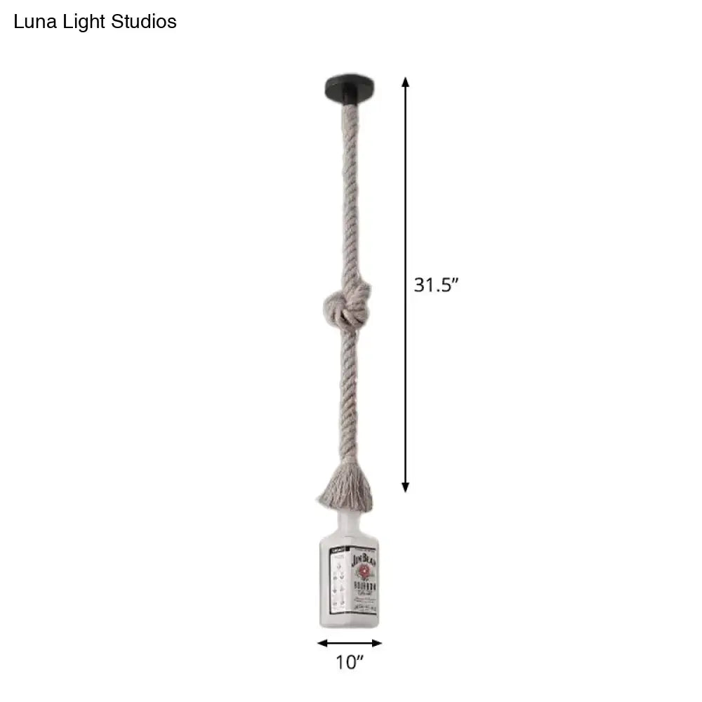A frosted white glass pendant light shaped like a black wine bottle with beige rope cord and black ceiling mount