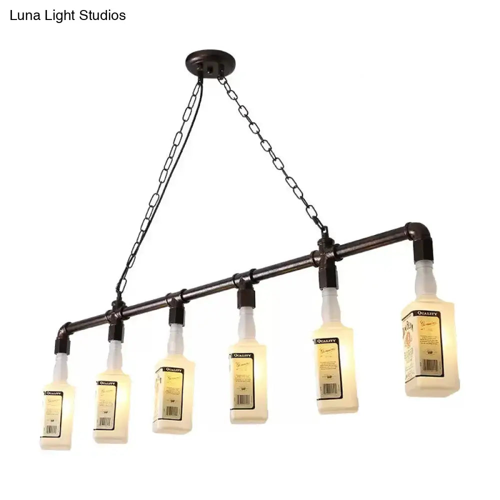 Industrial-style chandelier with five illuminated black wine bottles on frosted white glass hanging from dark metal frame