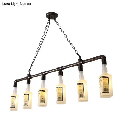 Industrial-style chandelier with five illuminated black wine bottles on frosted white glass hanging from dark metal frame