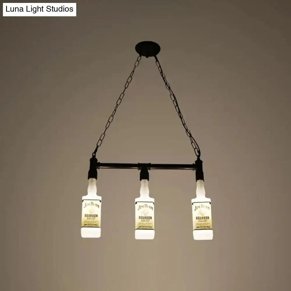 Black metal chandelier with three illuminated jim beam bourbon bottles suspended by chains for restaurant lighting