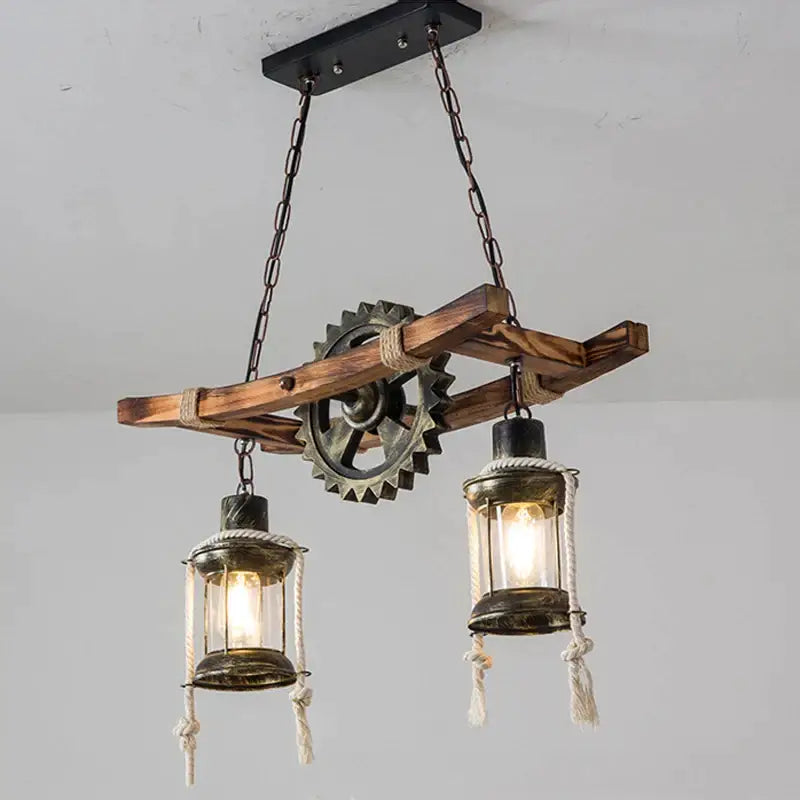 Decorbites gear industrial chandelier pendant with rustic wooden beam dark metal gear and two glass lanterns for dining room