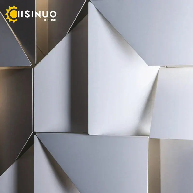 Decorbites geometric art wall lamp with brushed metallic and matte white triangular panels for modern indoor lighting