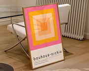 Decorbites™ geometric bauhaus canvas poster with pink yellow and orange concentric squares on white background