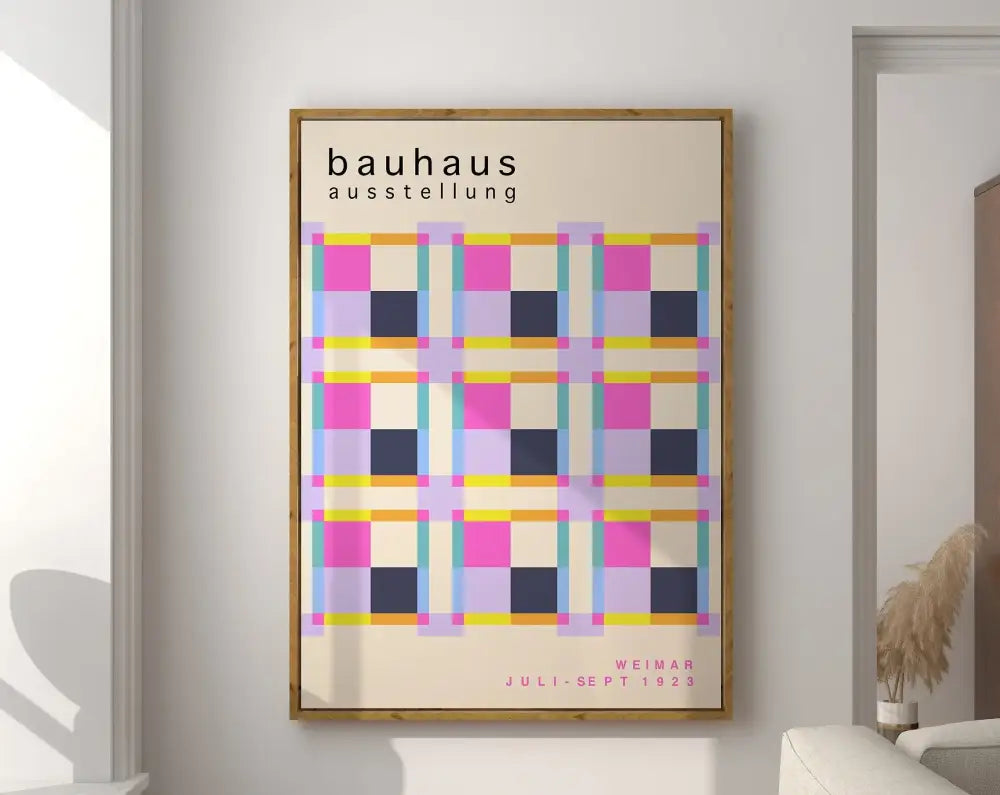 A framed decorbites™ geometric bauhaus canvas poster featuring pink navy blue yellow and teal squares on off-white background