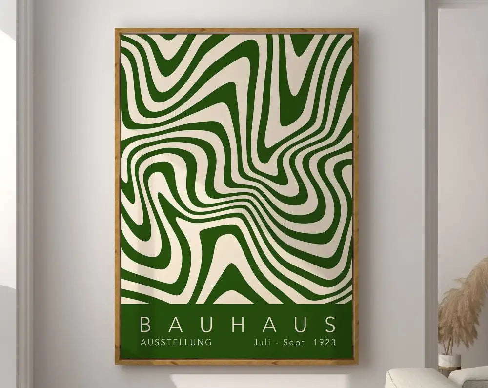 A framed decorbites geometric bauhaus canvas poster with bold green and cream wavy lines in a light wood frame