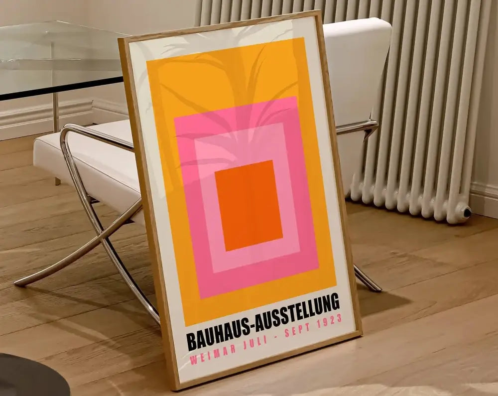 A framed decorbites geometric bauhaus canvas poster with bold orange pink and yellow shapes for modern home decor