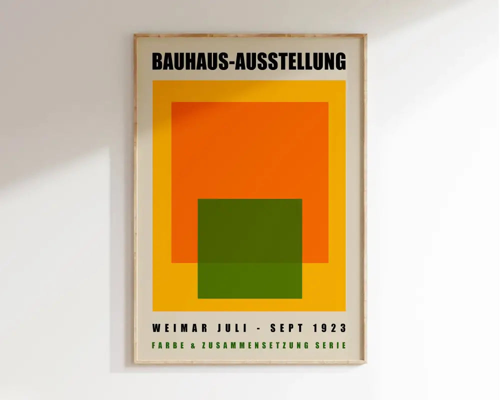 A framed decorbites™ geometric bauhaus canvas poster with bold orange green and yellow shapes on a cream background