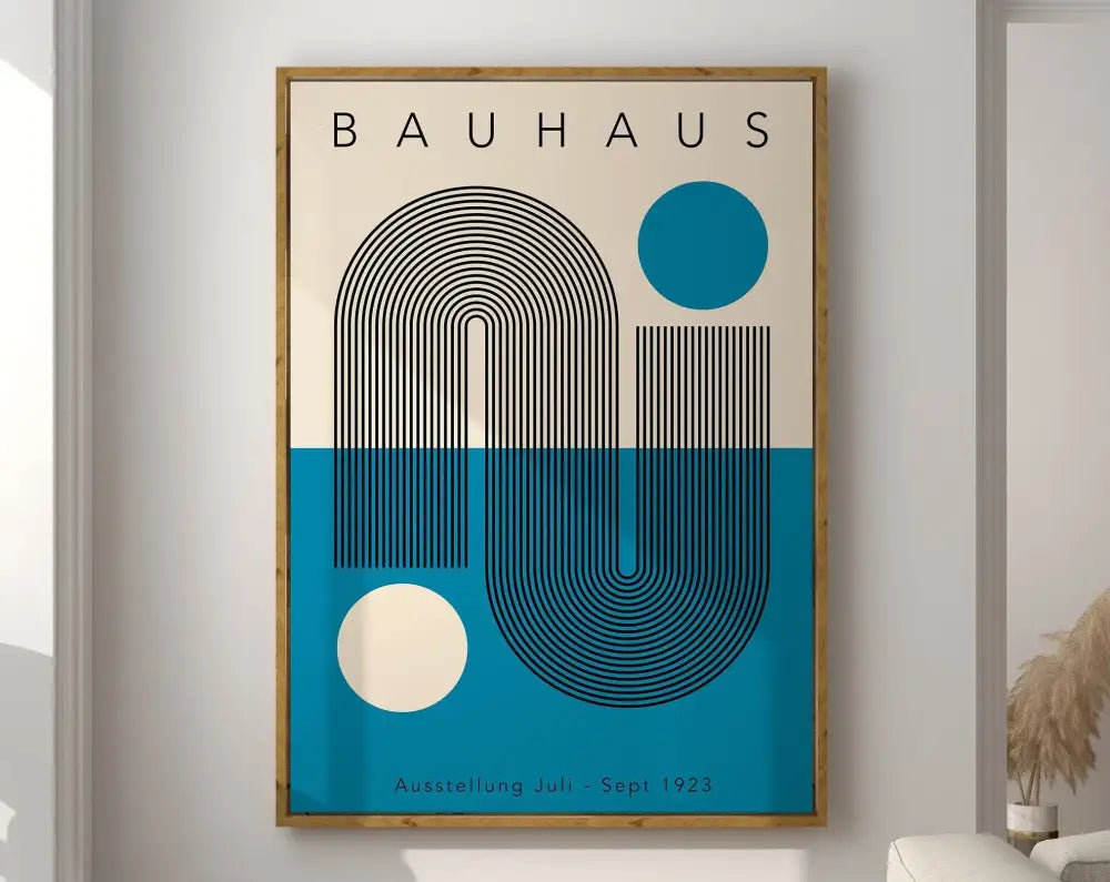 A framed decorbites™ geometric bauhaus canvas poster with black curved lines on cream and teal background in light wood frame