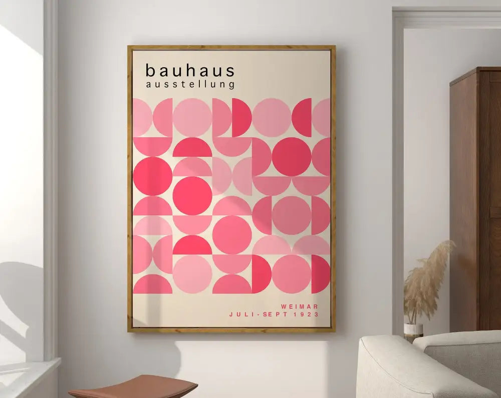 Framed geometric bauhaus canvas poster with pink overlapping circles and juli-sept 1923 text for modern decor