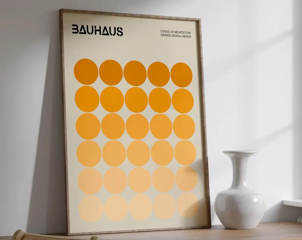 Decorbites™ geometric bauhaus canvas poster with bold black text and orange circles on off-white canvas in light wood frame