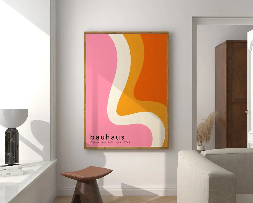 A framed decorbites™ geometric bauhaus canvas poster with bold pink orange and cream abstract waves and black text