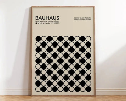 Beige geometric bauhaus canvas poster with black circular patterns in a light wood frame for stylish home decor