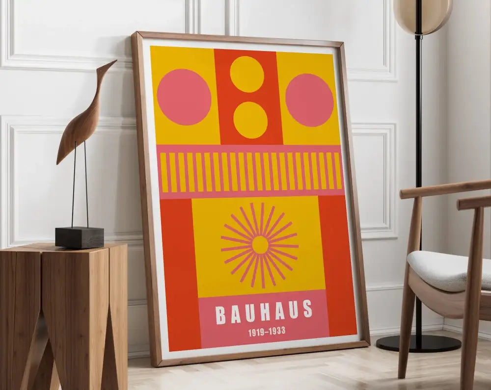 A vibrant decorbites™ geometric bauhaus canvas poster with pink and yellow circles in a wooden frame