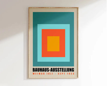 A framed geometric bauhaus canvas print featuring concentric teal, light blue, orange, and yellow squares for modern home