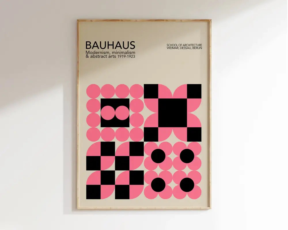 A framed DecorBites™ geometric bauhaus canvas wall art with pink and black circles in checkered patterns
