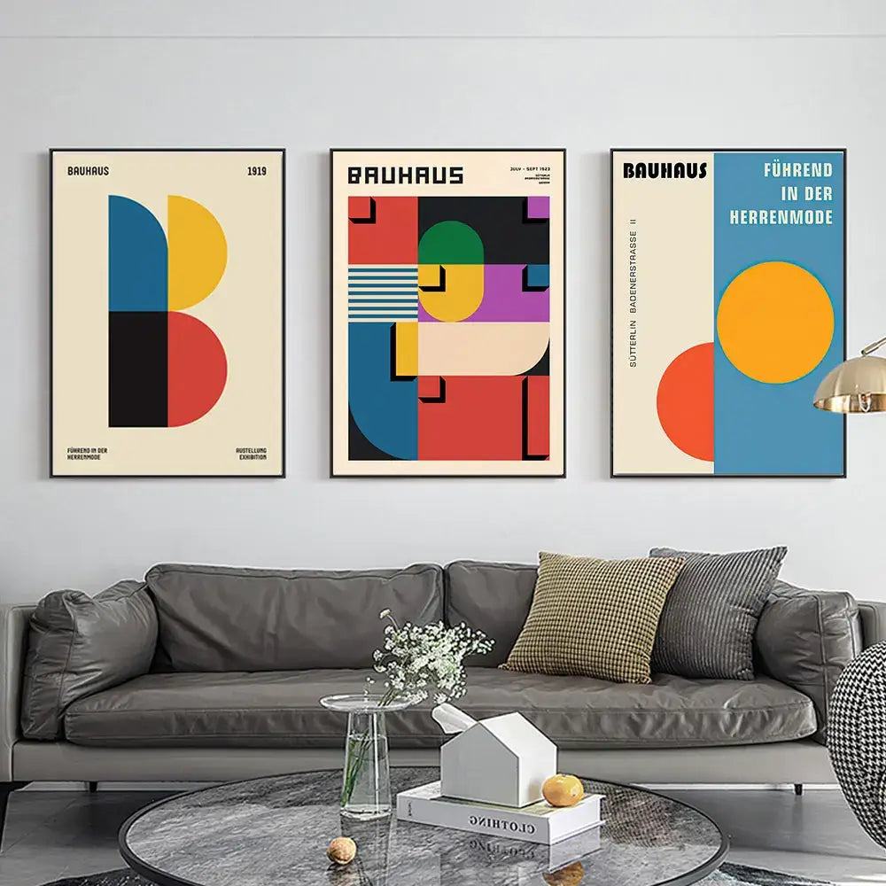 Three framed decorbites™ geometric bauhaus pop art canvas prints with bold colors on cream backgrounds in art canvas style