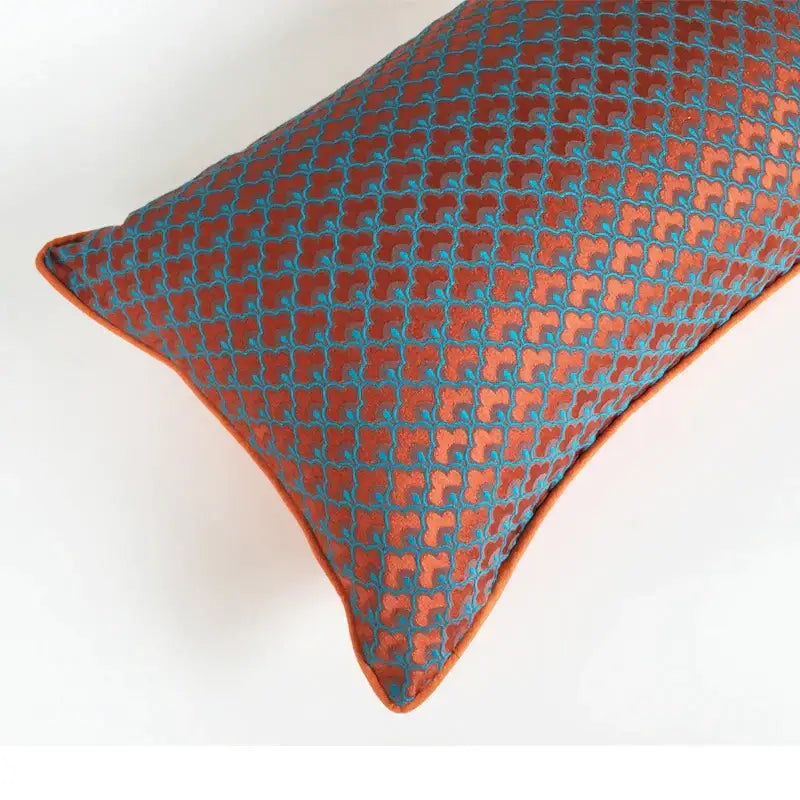 Rectangular decorbites geometric blue and red jacquard waist pillow case with textured orange and teal pattern and orange trim