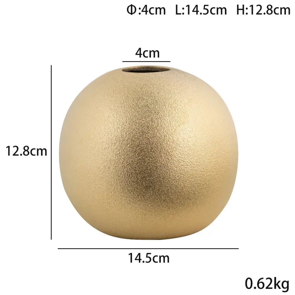Matte gold decorbites geometric gold ceramic spherical vase with textured surface and small circular opening for living room