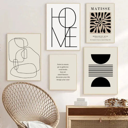 Minimalist black and white boho canvas wall art featuring geometric leaf rainbow abstract designs and typography