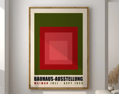 Framed decorbites™ geometric modernist canvas art print featuring red and green concentric squares with black bauhaus text