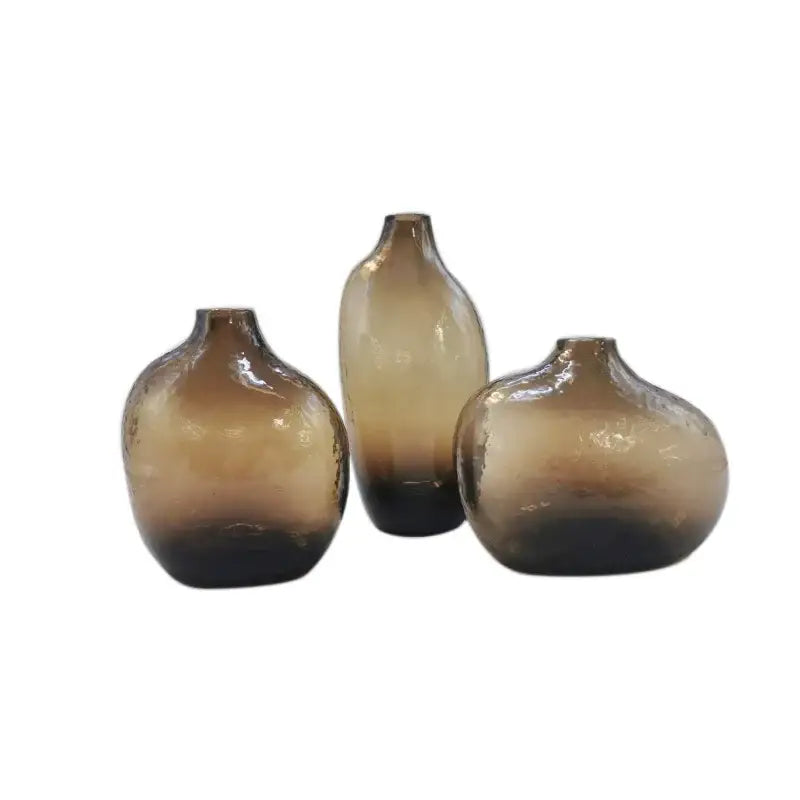 Set of three amber-tinted glass vases with geometric zen glass design and textured finish for single flower arrangement