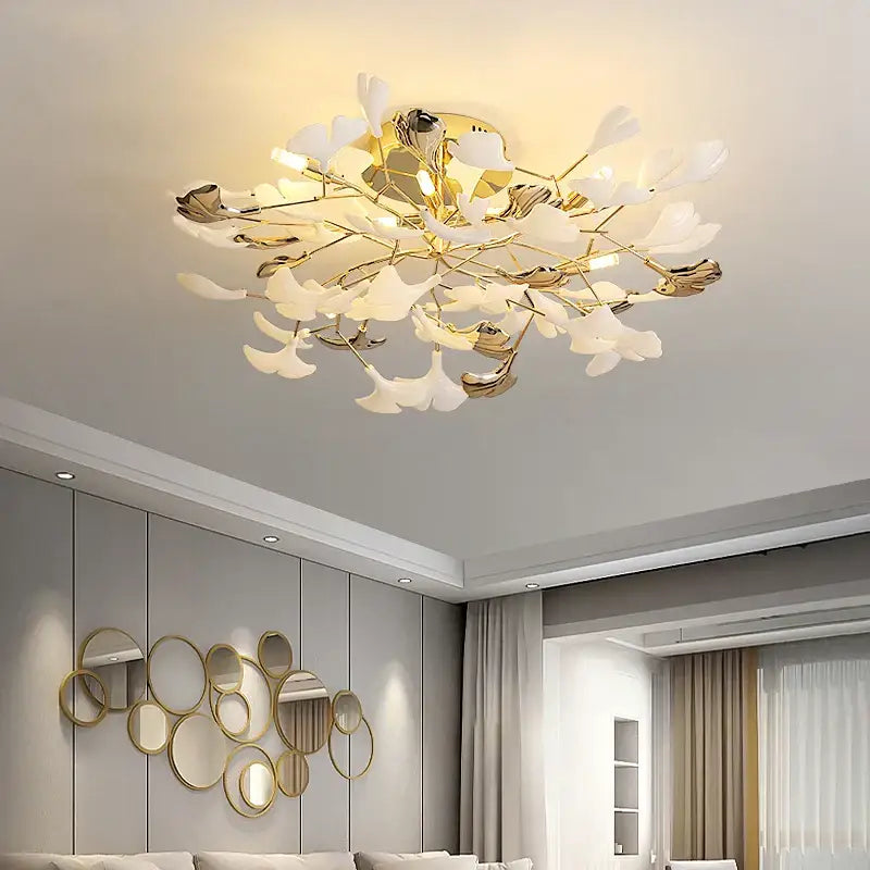 Gold-toned decorbites ginkgo leaf ceiling light with white leaf-shaped acrylic elements for elegant bedroom lighting