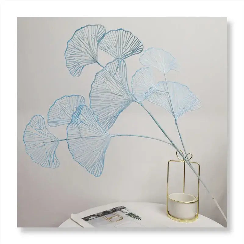 Delicate light blue ginkgo leaf branch artificial flowers in a gold-toned geometric vase by DecorBites Ginkgo Leaf