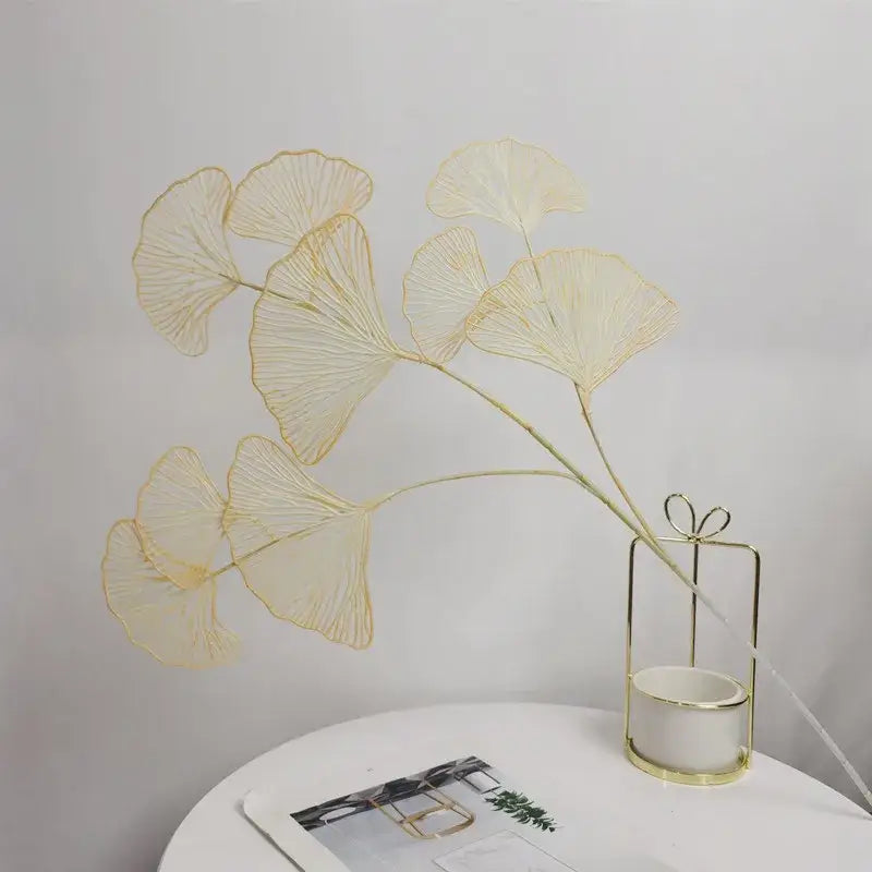 Delicate gold-toned wire decorbites ginkgo leaf branch with translucent fan-shaped artificial flowers for home decor