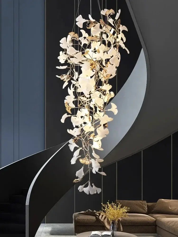 Elegant white and gold decorbites ginkgo leaf chandelier with delicate cascading design for luxury staircase and lobby lighting