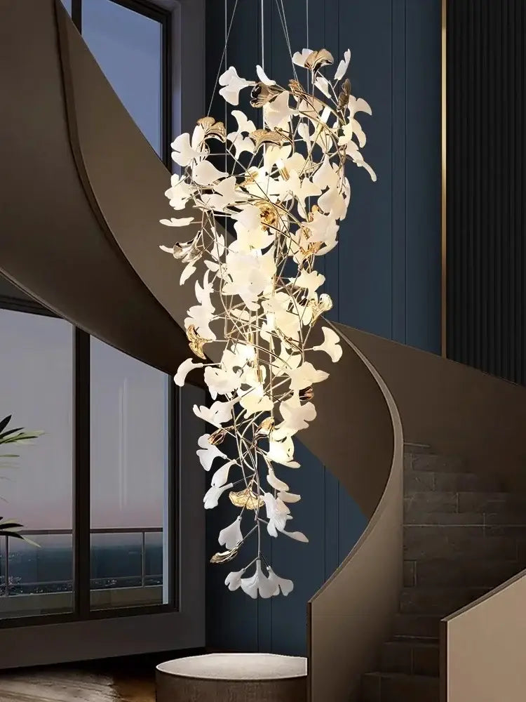 Elegant white and gold decorbites ginkgo leaf chandelier with delicate cascading design for luxury staircases and lobbies